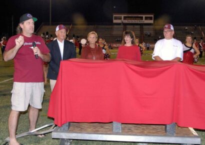 If Heaven Can Send Smiles, Coach Henderson Had a Big One Friday; Benches Dedicated in his Memory