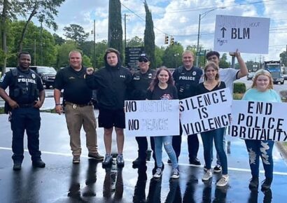 Groups in Millbrook Peacefully Protest; Police Respond with Water, Smiles