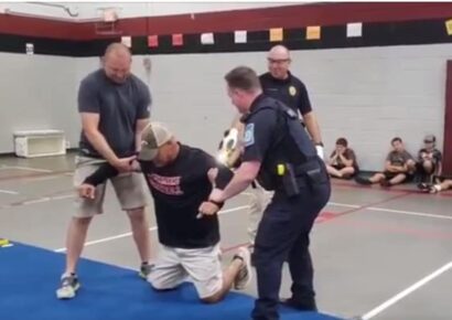 SEHS Principal Fuller ‘Rides the Lightning’ During Taser Demonstration for Junior Police Academy