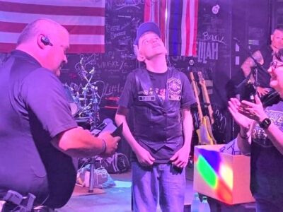 Austin ‘Fearless’ Booth Sworn In as Honorary Millbrook Officer During Blue Santa Fundraiser