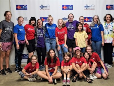 American Heritage Girls Visit Mission to North America Warehouse, Deliver Hygiene Kits