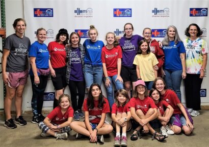 American Heritage Girls Visit Mission to North America Warehouse, Deliver Hygiene Kits