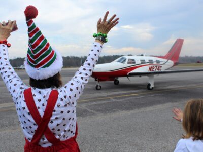 Area Children Greet Santa and Mrs. Clause as They Fly in To Prattville