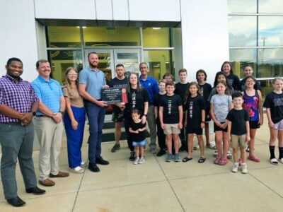 April Bickhaus wins June Long Lewis Hero of the Month Award