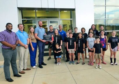 April Bickhaus wins June Long Lewis Hero of the Month Award