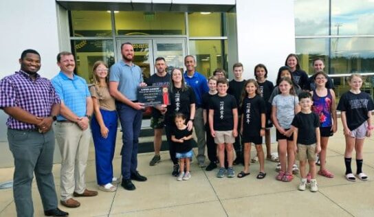 April Bickhaus wins June Long Lewis Hero of the Month Award