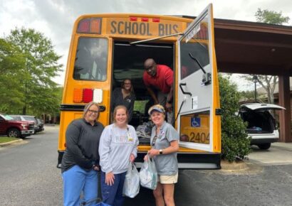 Locals penciled in time to ‘Stuff the Bus’ for Autauga County Schools