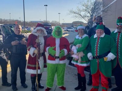 Santa, his elves and the Grinch spread Christmas cheer through Prattville