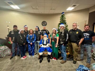 Operation Blue Santa brings presents and a visit with Santa Claus in Millbrook