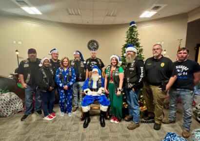 Operation Blue Santa brings presents and a visit with Santa Claus in Millbrook