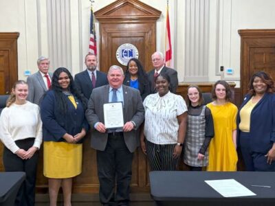 FBLA members from Millbrook visit with Commissioners about Career Tech organizations