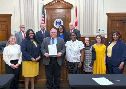 FBLA members from Millbrook visit with Commissioners about Career Tech organizations