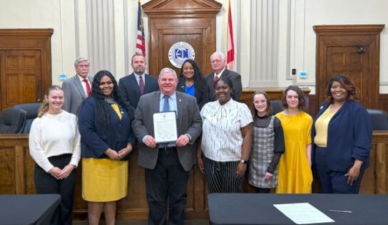 FBLA members from Millbrook visit with Commissioners about Career Tech organizations