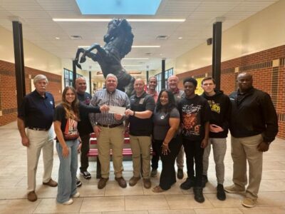 SEHS JROTC receives $200,000 donation from Commission for obstacle course, rappelling tower project