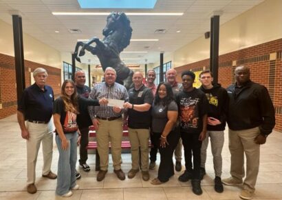 SEHS JROTC receives $200,000 donation from Commission for obstacle course, rappelling tower project