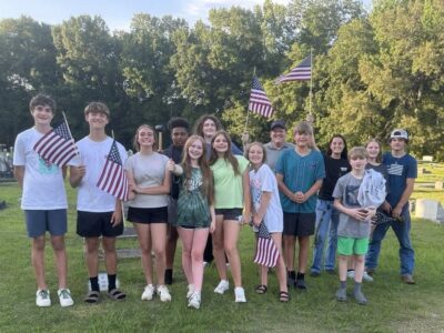 Cain’s Chapel Youth Group places flags on Veterans’ graves at historic Cemetery