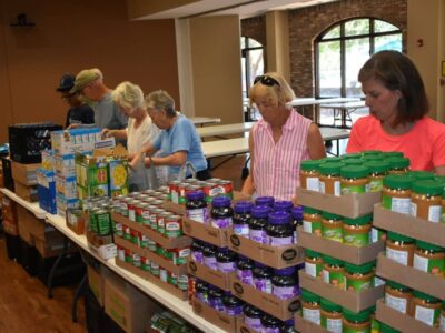 Area church members step up to help Meals on Wheels for Christmas in July