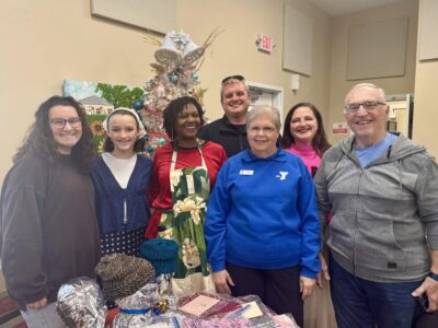 Millbrook Senior Center participants receive 100 hand-knitted hats thanks to Janet Frazier’s holiday mission