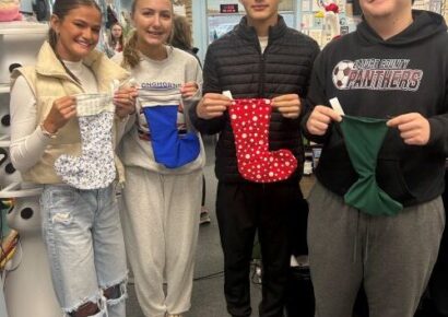 ECHS students stitch tradition, build skills through holiday stocking project