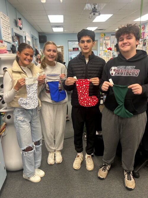 ECHS students stitch tradition, build skills through holiday stocking project