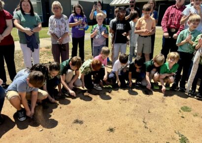 Victory Christian Academy students break ground on expansion project during last day of school