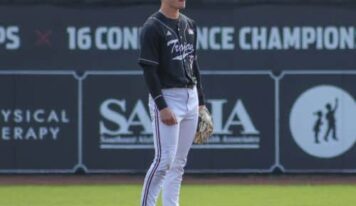 Elmore County native Sean Darnell hits a home run for Troy in College World Series win over Ole Miss